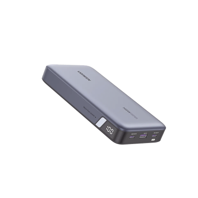 Imagen de Power Bank de 25000mAh | 3 Salidas 145W Max. | USB-A + 2 USB-C | PD 3.0, QC3.0 | FCP | SCP | Pantalla Inteligente | Carcasa Ignifuga | Color Gris | Incluye Cable USB de 50cm | Carga tu Laptop de Manera Segura.